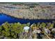 Aerial view of a house with a waterfront view and nearby homes at 462 Mohican Dr., Georgetown, SC 29440