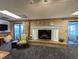 Basement with a brick fireplace, access to a patio, and comfy seating at 462 Mohican Dr., Georgetown, SC 29440