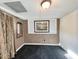 Finished basement room with brick accent wall and dark carpet at 462 Mohican Dr., Georgetown, SC 29440