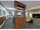 Basement features a room divider with a ship's wheel and built-in shelves at 462 Mohican Dr., Georgetown, SC 29440
