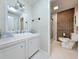 Bathroom with shower, toilet and white vanity with a vessel sink at 462 Mohican Dr., Georgetown, SC 29440