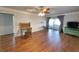 Spacious bedroom with hardwood floors and access to a sunroom at 462 Mohican Dr., Georgetown, SC 29440