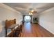Spacious bedroom with hardwood floors and access to a sunroom at 462 Mohican Dr., Georgetown, SC 29440