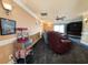 Relax in this home theater, featuring comfortable seating and large screen TV at 462 Mohican Dr., Georgetown, SC 29440