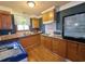 Cozy kitchen with wood cabinets, and modern appliances at 462 Mohican Dr., Georgetown, SC 29440