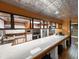 White cabinets, stainless steel appliances, and a large breakfast bar at 462 Mohican Dr., Georgetown, SC 29440