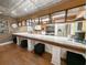 Kitchen features a breakfast bar, stainless steel appliances, and decorative tin ceiling at 462 Mohican Dr., Georgetown, SC 29440