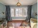 Bright living room with hardwood floors and large windows at 462 Mohican Dr., Georgetown, SC 29440