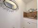 Small powder room with a sink and decorative mirror at 462 Mohican Dr., Georgetown, SC 29440