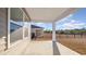 Covered back patio with view of fenced backyard at 5800 Ellisridge Ct, Conway, SC 29526