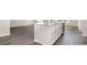 White kitchen island with granite countertop at 5800 Ellisridge Ct, Conway, SC 29526