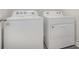 Bright laundry room with side-by-side washer and dryer at 5800 Ellisridge Ct, Conway, SC 29526