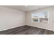 Bedroom featuring LVP flooring and a large window for natural light at 5805 Ellisridge Ct, Conway, SC 29526