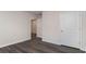 Hallway with neutral paint and gray, luxury vinyl plank flooring at 5805 Ellisridge Ct, Conway, SC 29526