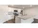 Stylish kitchen with stainless steel appliances, a granite island with a sink, and lots of storage space at 5805 Ellisridge Ct, Conway, SC 29526