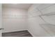 Walk-in closet featuring wire shelving and gray, luxury vinyl plank flooring at 5805 Ellisridge Ct, Conway, SC 29526