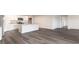 Modern kitchen with granite counters, stainless appliances, and hard wood flooring at 6008 Fuller Ridge Ct, Conway, SC 29526