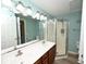 Clean bathroom with double vanity and a walk-in shower at 613 Sea Mountain Hwy. # 128, North Myrtle Beach, SC 29582