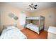 Bedroom with twin and full-size bunk beds, coastal decor at 613 Sea Mountain Hwy. # 128, North Myrtle Beach, SC 29582