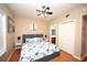 Bright bedroom featuring a king-size bed and en-suite bathroom at 613 Sea Mountain Hwy. # 128, North Myrtle Beach, SC 29582