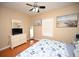 Well-lit bedroom with a king-size bed and coastal-themed art at 613 Sea Mountain Hwy. # 128, North Myrtle Beach, SC 29582