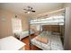 Bedroom with twin and full-size bunk beds, coastal decor at 613 Sea Mountain Hwy. # 128, North Myrtle Beach, SC 29582