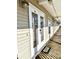 Condo building exterior showcasing entrance and hallway at 613 Sea Mountain Hwy. # 128, North Myrtle Beach, SC 29582