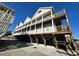 Condo building's exterior showcasing multiple levels and balconies at 613 Sea Mountain Hwy. # 128, North Myrtle Beach, SC 29582