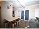 Kitchen with light wood cabinets and black appliances at 613 Sea Mountain Hwy. # 128, North Myrtle Beach, SC 29582