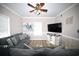 Beach-themed living room with sectional sofa and large TV at 613 Sea Mountain Hwy. # 128, North Myrtle Beach, SC 29582