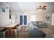 Living room with sectional sofa and kitchen bar at 613 Sea Mountain Hwy. # 128, North Myrtle Beach, SC 29582