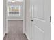 Image shows a hallway with neutral walls and carpeting, offering a seamless transition between rooms at 626 Lorenzo Dr. # 626, North Myrtle Beach, SC 29582