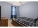 Serene bedroom with blue walls, neutral carpet, and a comfortable bed with a blue patterned comforter at 775 Oyster Bluff Dr., Myrtle Beach, SC 29588