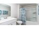 Clean bathroom with shower/tub combo and white vanity at 8059 Bear Claw Way, Conway, SC 29526