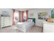Bright bedroom with twin bed, dresser, and colorful wall art at 8059 Bear Claw Way, Conway, SC 29526