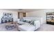 Spacious bonus room with sectional sofa and game table at 8059 Bear Claw Way, Conway, SC 29526