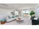 Bright bonus room with sectional sofa, large windows, and a game table at 8059 Bear Claw Way, Conway, SC 29526