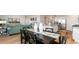 Bright dining area with a dark wood table and seating for six at 8059 Bear Claw Way, Conway, SC 29526