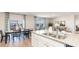 Kitchen with island, stainless steel appliances, and view to dining area at 8059 Bear Claw Way, Conway, SC 29526
