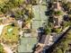 Aerial view of tennis courts and resort buildings at 100 Ocean Creek Dr. # F-1, Myrtle Beach, SC 29572