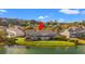 Aerial view of townhouse backing up to a pond at 1010 Pinnacle Ln. # 1010, Myrtle Beach, SC 29577