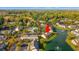 Aerial view highlighting a townhouse near a pond and pool at 1010 Pinnacle Ln. # 1010, Myrtle Beach, SC 29577