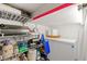 Storage room with shelving, mini-fridge, and organizers at 1010 Pinnacle Ln. # 1010, Myrtle Beach, SC 29577