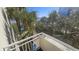 Balcony with partial ocean view and tropical foliage at 1105 S Ocean Blvd. # 236, Myrtle Beach, SC 29577