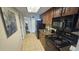 Small galley kitchen with black appliances at 1105 S Ocean Blvd. # 236, Myrtle Beach, SC 29577
