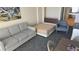 Living room with sofa bed, chair, and dining table at 1105 S Ocean Blvd. # 236, Myrtle Beach, SC 29577