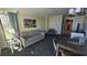 Living room with sofa and dining area at 1105 S Ocean Blvd. # 236, Myrtle Beach, SC 29577