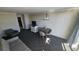 Living room with sofa, dining table, and kitchen access at 1105 S Ocean Blvd. # 236, Myrtle Beach, SC 29577