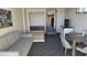 Living room features sofa bed, chair, and dining area at 1105 S Ocean Blvd. # 236, Myrtle Beach, SC 29577