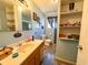 Clean bathroom with wood vanity and built-in shelving at 11253 Old Pee Dee Rd., Hemingway, SC 29554